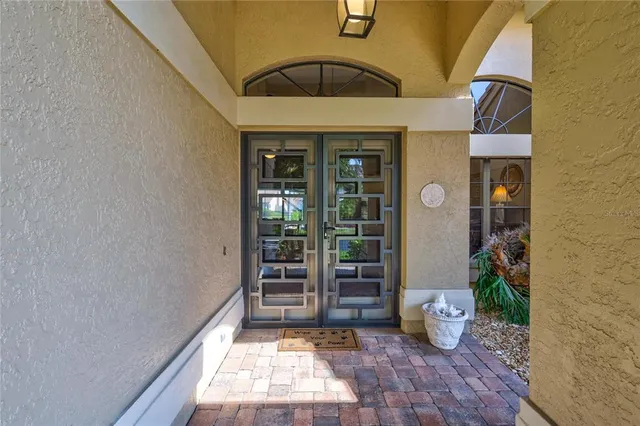 a kitchen with granite countertop a sink stove and cabinets