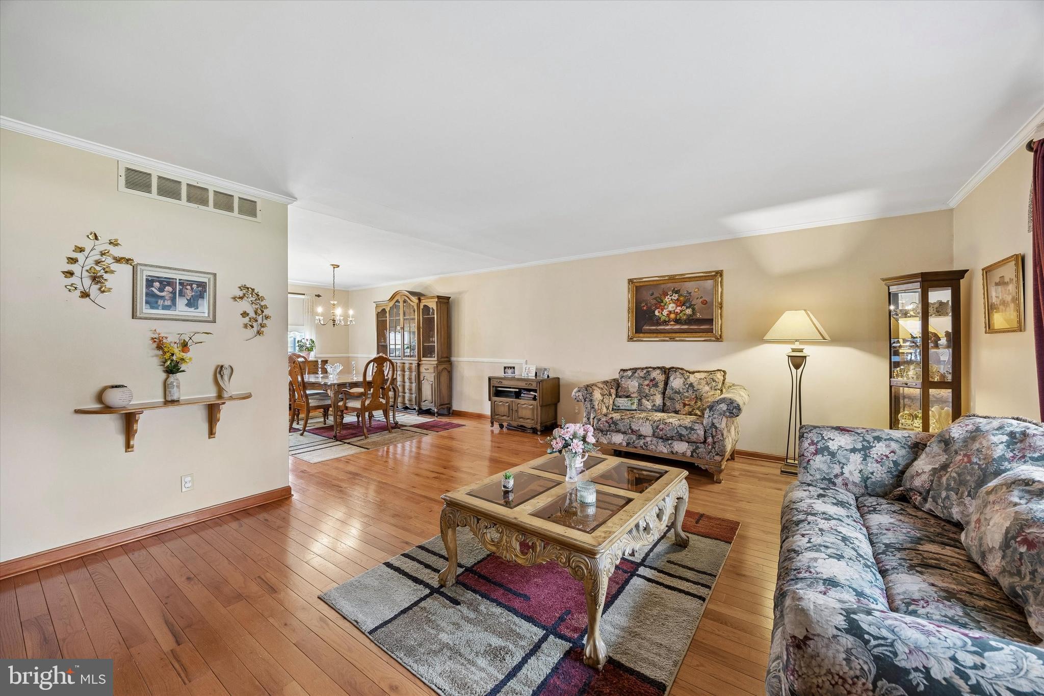 400 Woodhaven Road Philadelphia, PA 19116 - Photo 2 of 25 a living room with furniture and a table