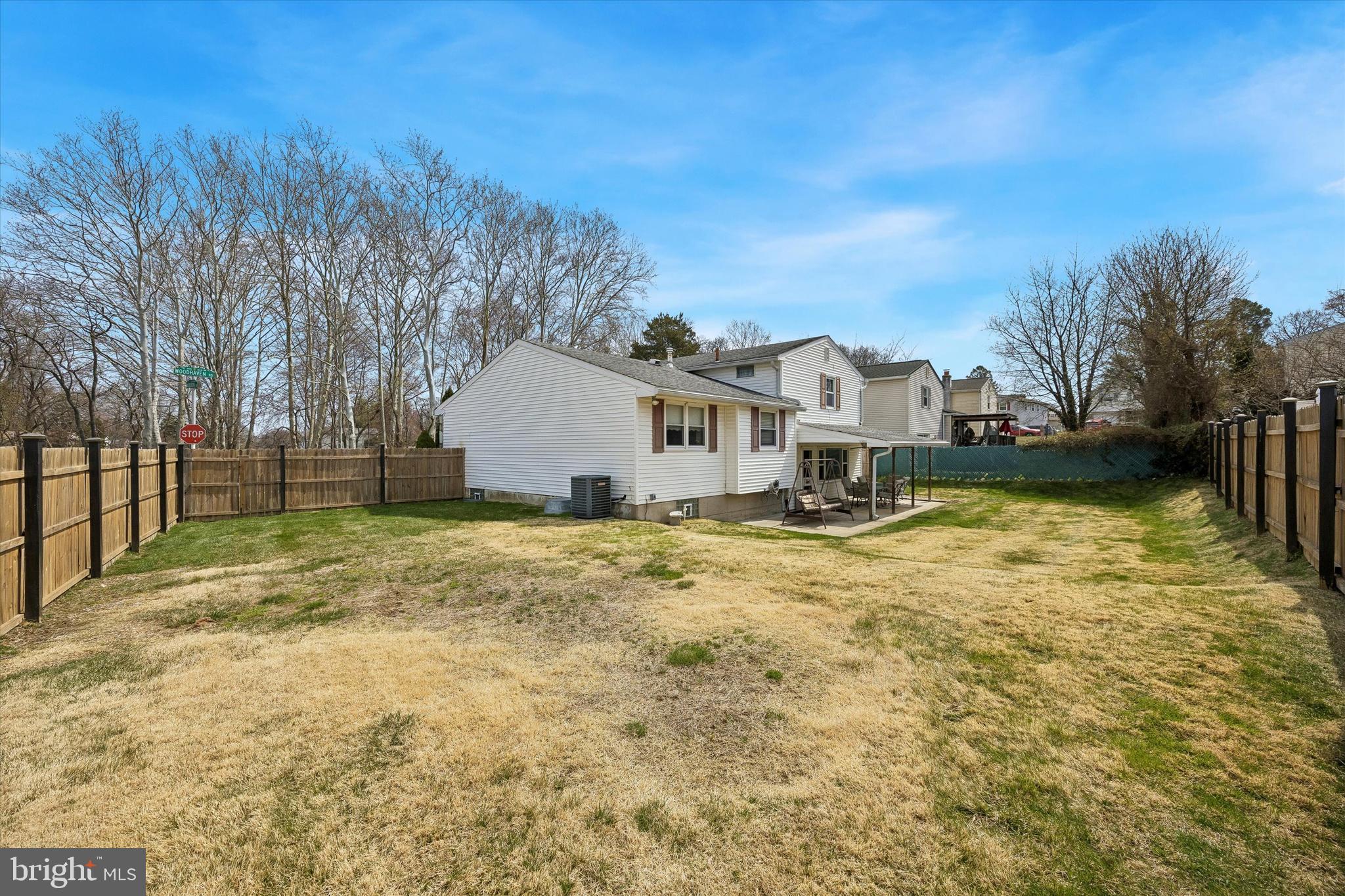 400 Woodhaven Road Philadelphia, PA 19116 - Photo 25 of 25 a view of a white house with a yard and sitting area