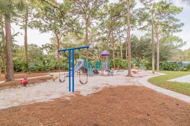 a view of a park with slide