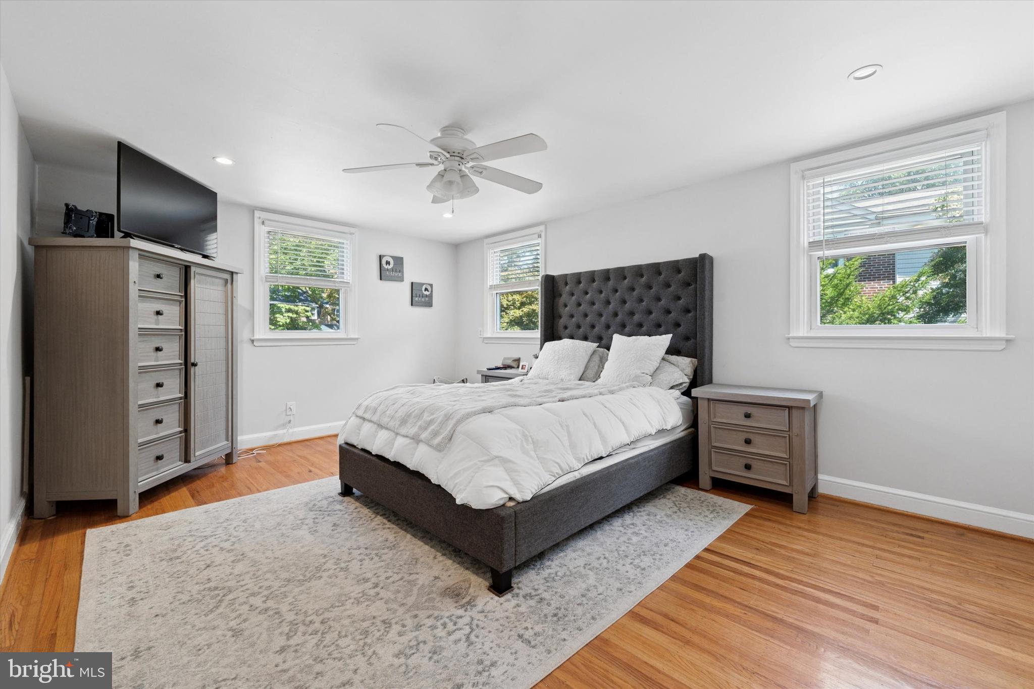 1636 Rose Glen Road Havertown, PA 19083 - Photo 14 of 38 a bedroom with a bed closet and flat tv screen