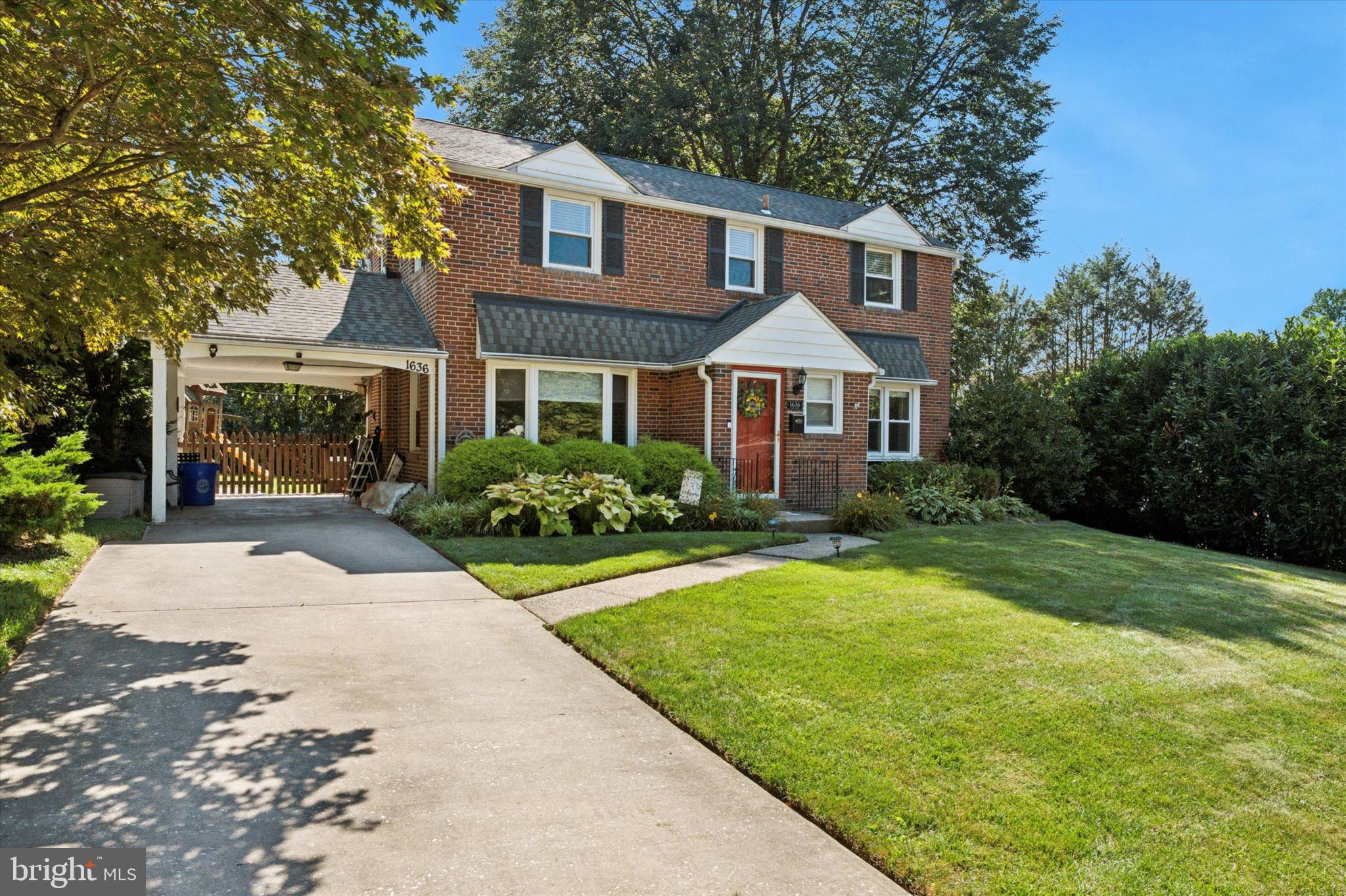 1636 Rose Glen Road Havertown, PA 19083 - Photo 2 of 38 a front view of a house with garden