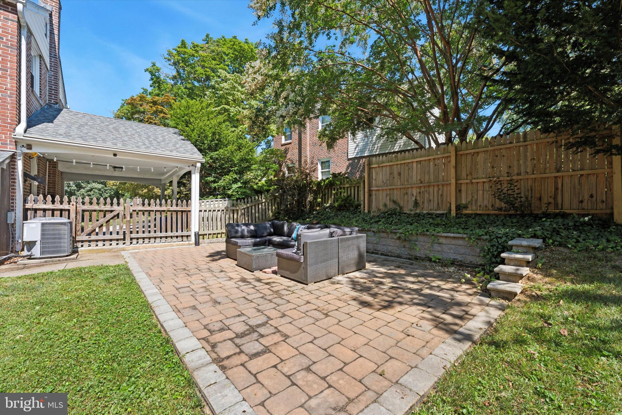 1636 Rose Glen Road Havertown, PA 19083 - Photo 32 of 38 a view of a backyard with a sitting area and furniture