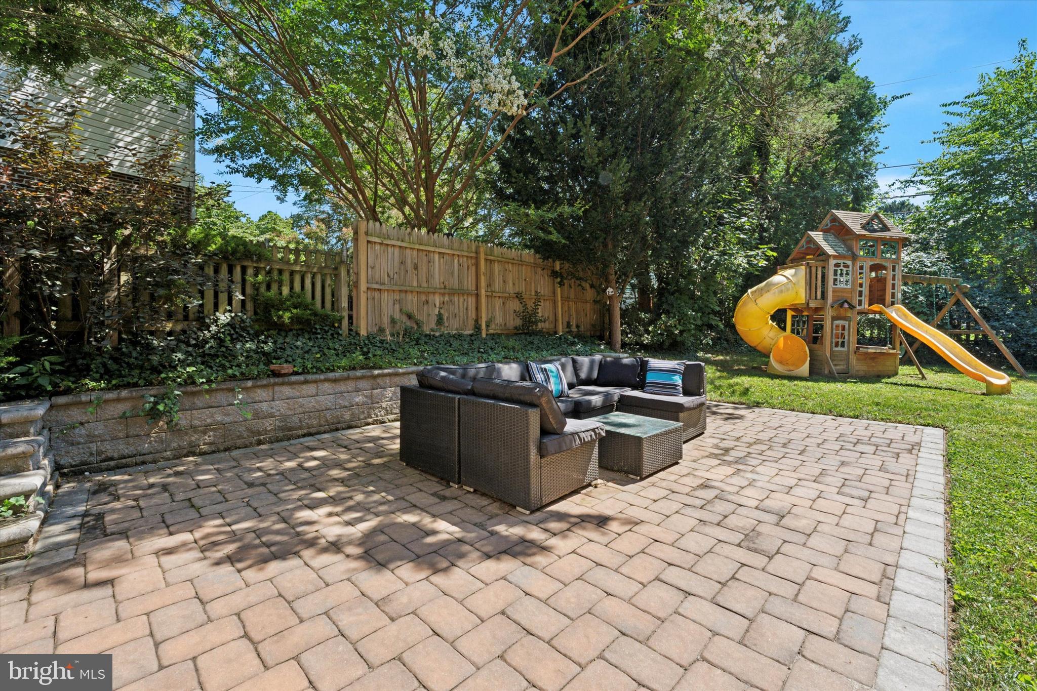 1636 Rose Glen Road Havertown, PA 19083 - Photo 33 of 38 a view of a backyard with fountain plants and tree