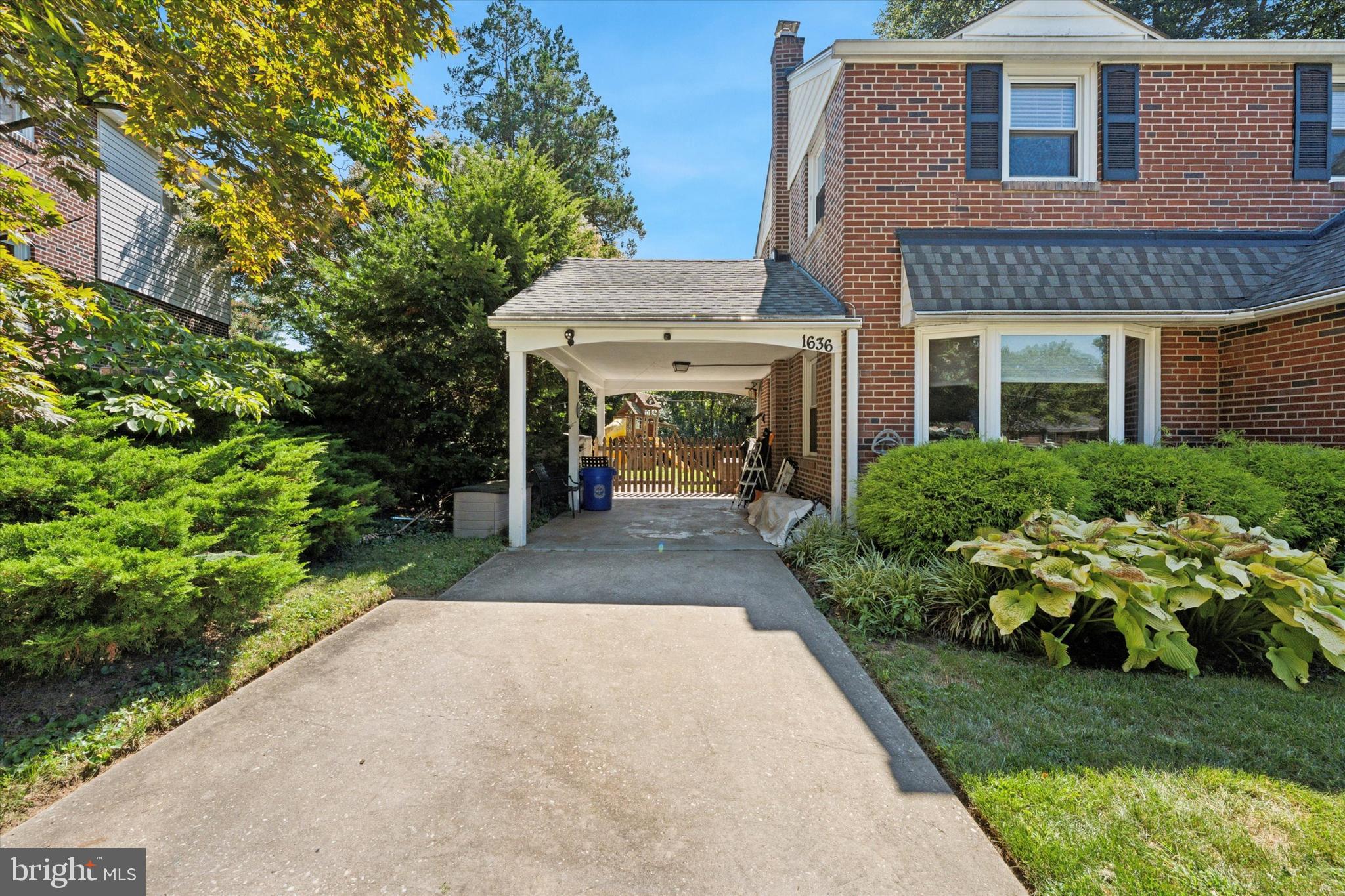 1636 Rose Glen Road Havertown, PA 19083 - Photo 4 of 38 front view of a house with a yard