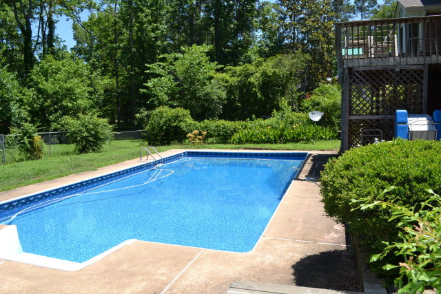230 Castlegate Road Macon, GA 31210 - Photo 3 of 3 a view of a backyard with plants