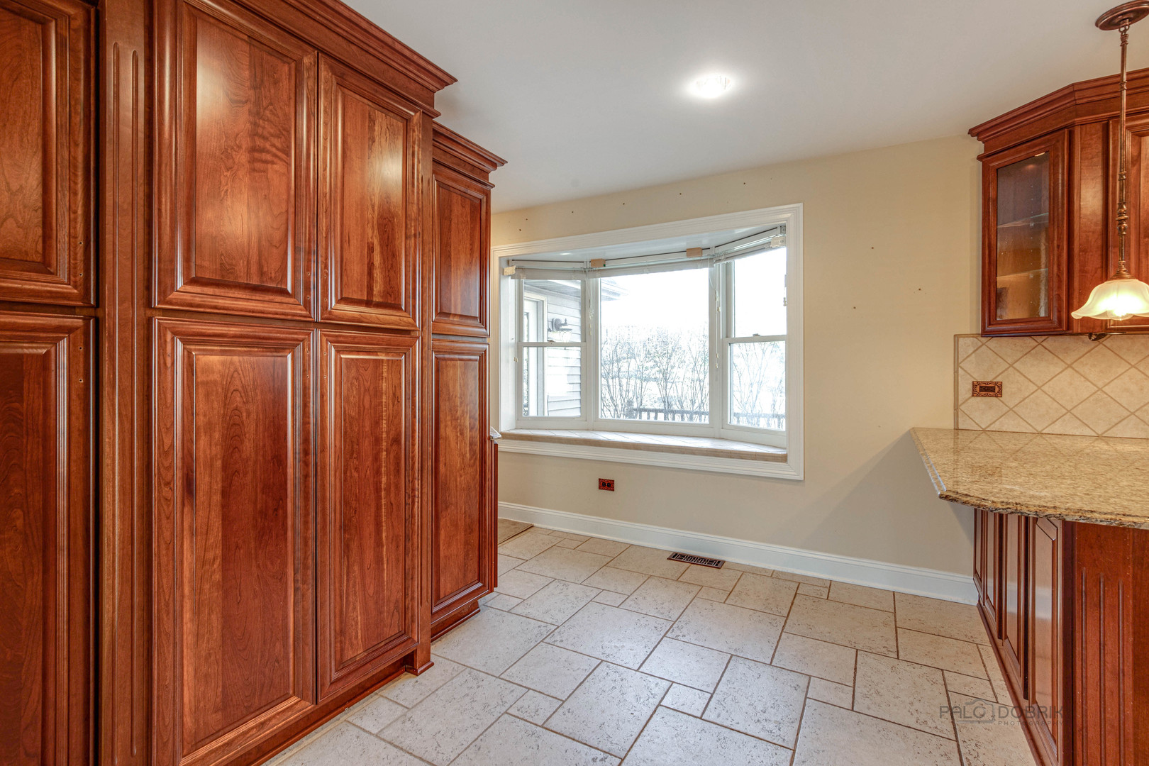 511 Alexander Boulevard Elmhurst, IL 60126 - Photo 13 of 38 a view of a kitchen with windows