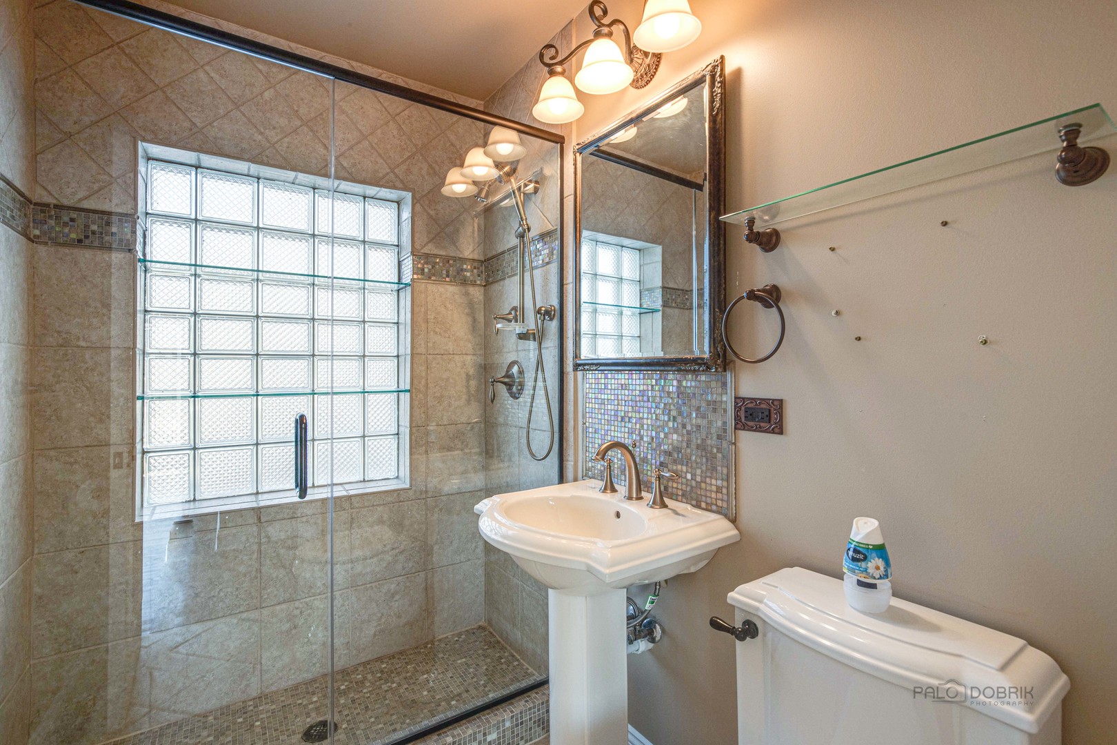 511 Alexander Boulevard Elmhurst, IL 60126 - Photo 16 of 38 a bathroom with a sink toilet and shower