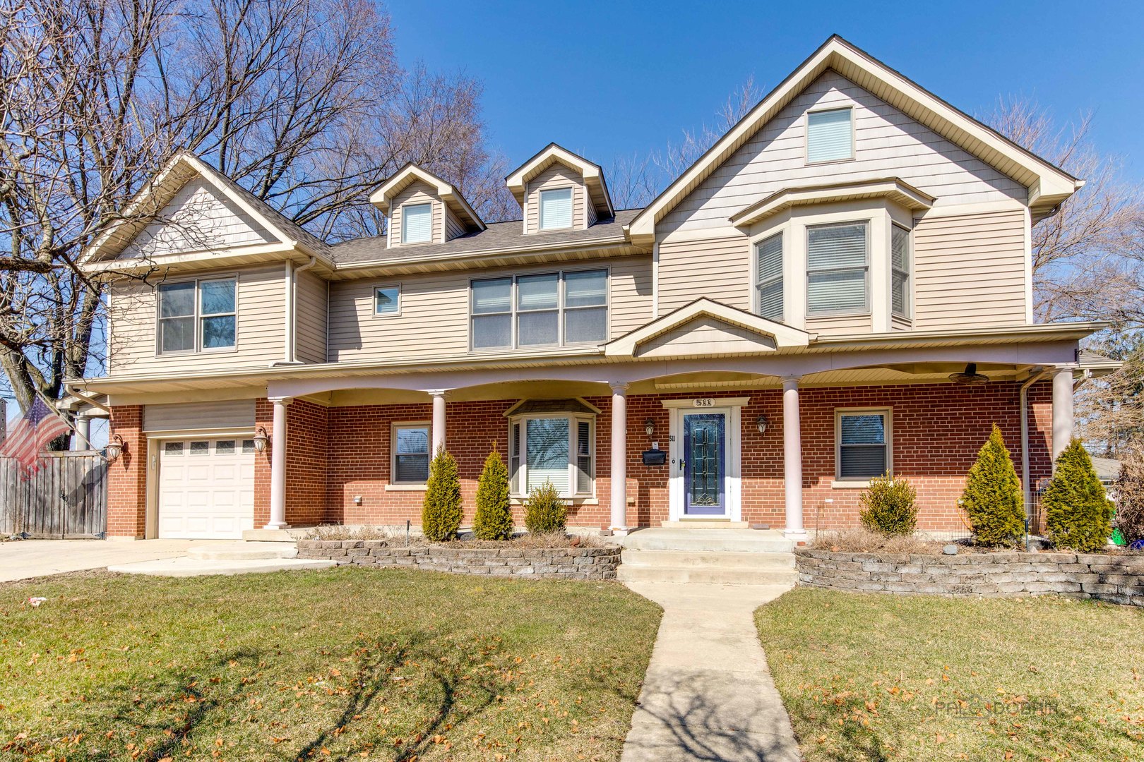 511 Alexander Boulevard Elmhurst, IL 60126 - Photo 3 of 38 front view of a house with a yard