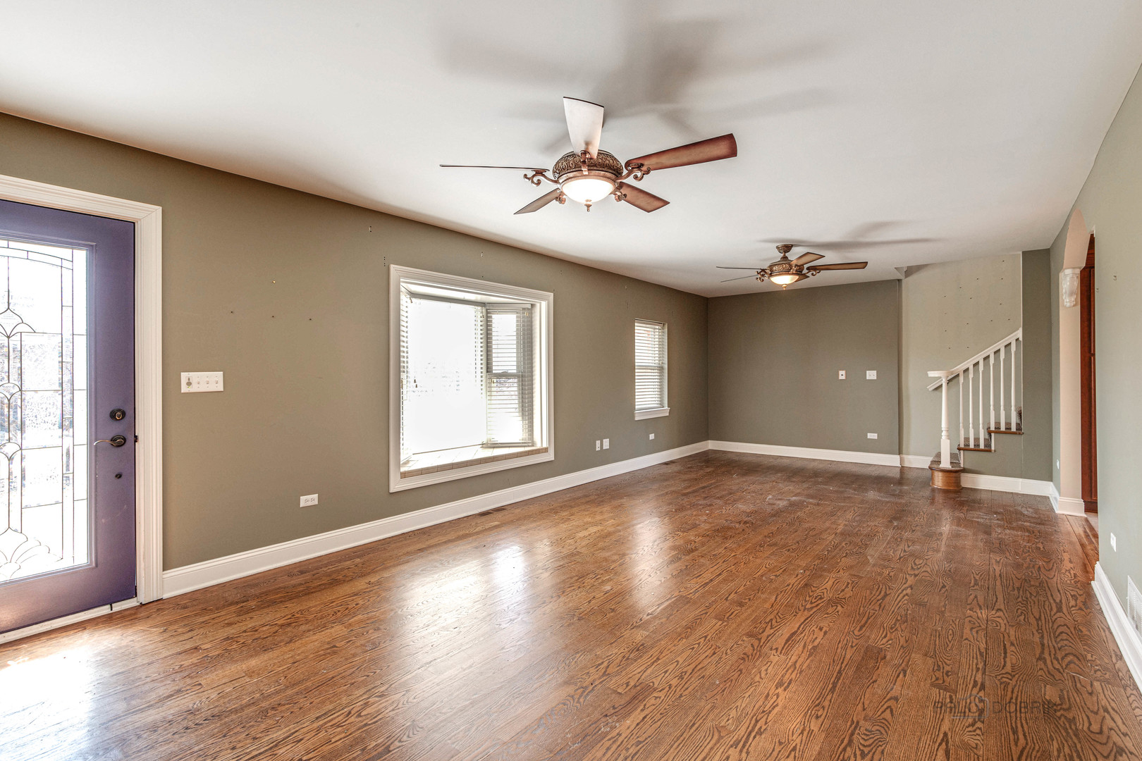 511 Alexander Boulevard Elmhurst, IL 60126 - Photo 7 of 38 a view of a livingroom with a ceiling fan and window