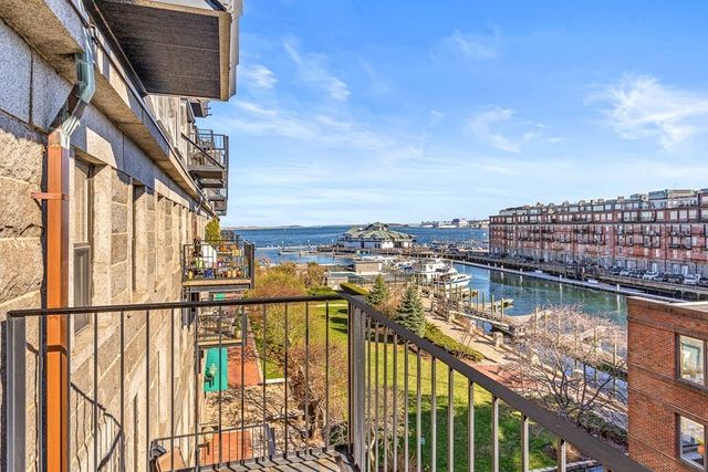 a view of swimming pool from a balcony