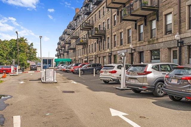 a patio with a table and chairs