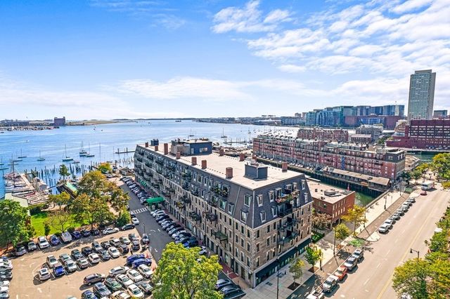 a picture of city view with lake view and boat