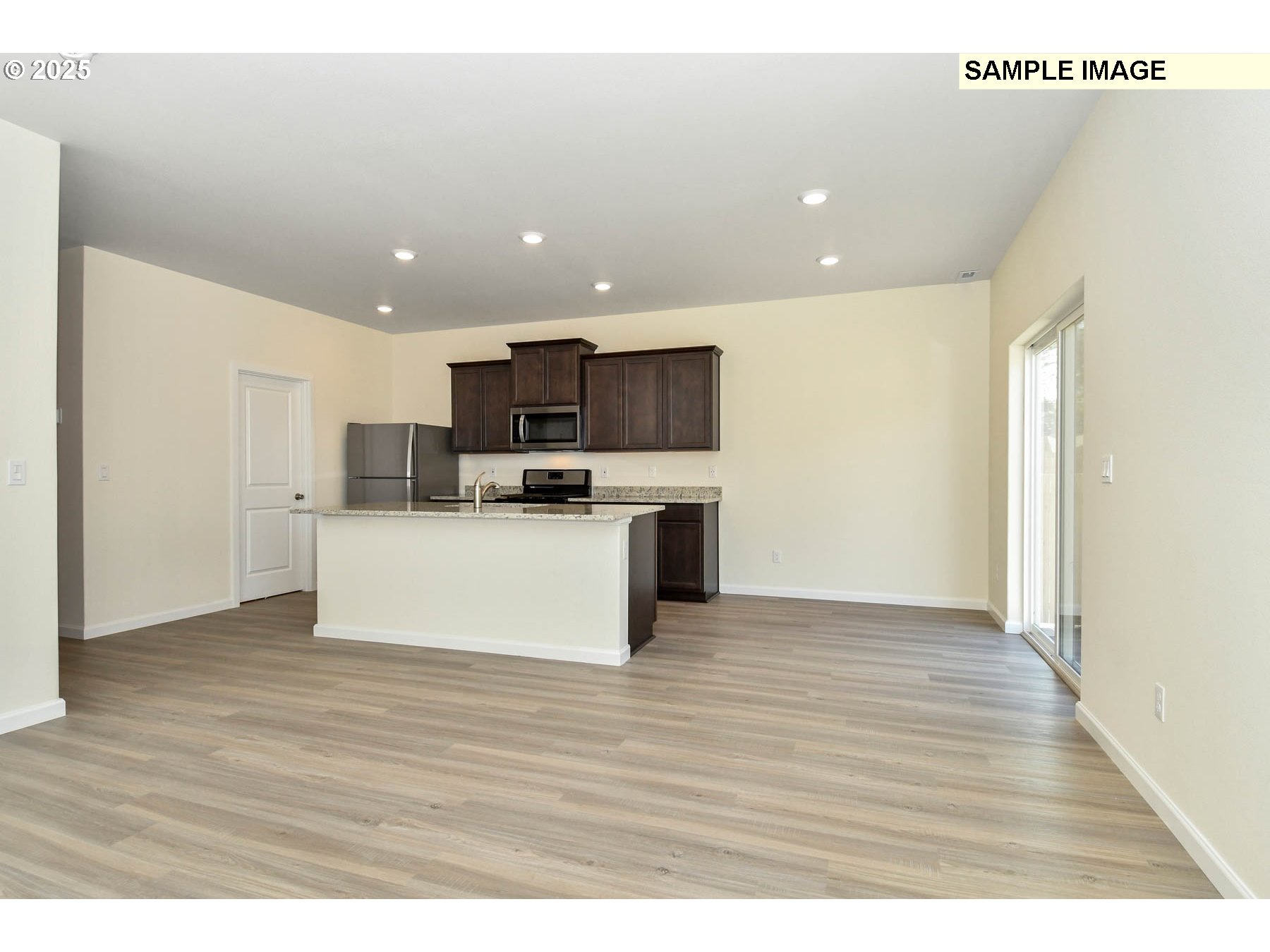 3982 Southwest Duniway Lane Gresham, OR 97080 - Photo 11 of 15 a view of kitchen view wooden cabinets and window