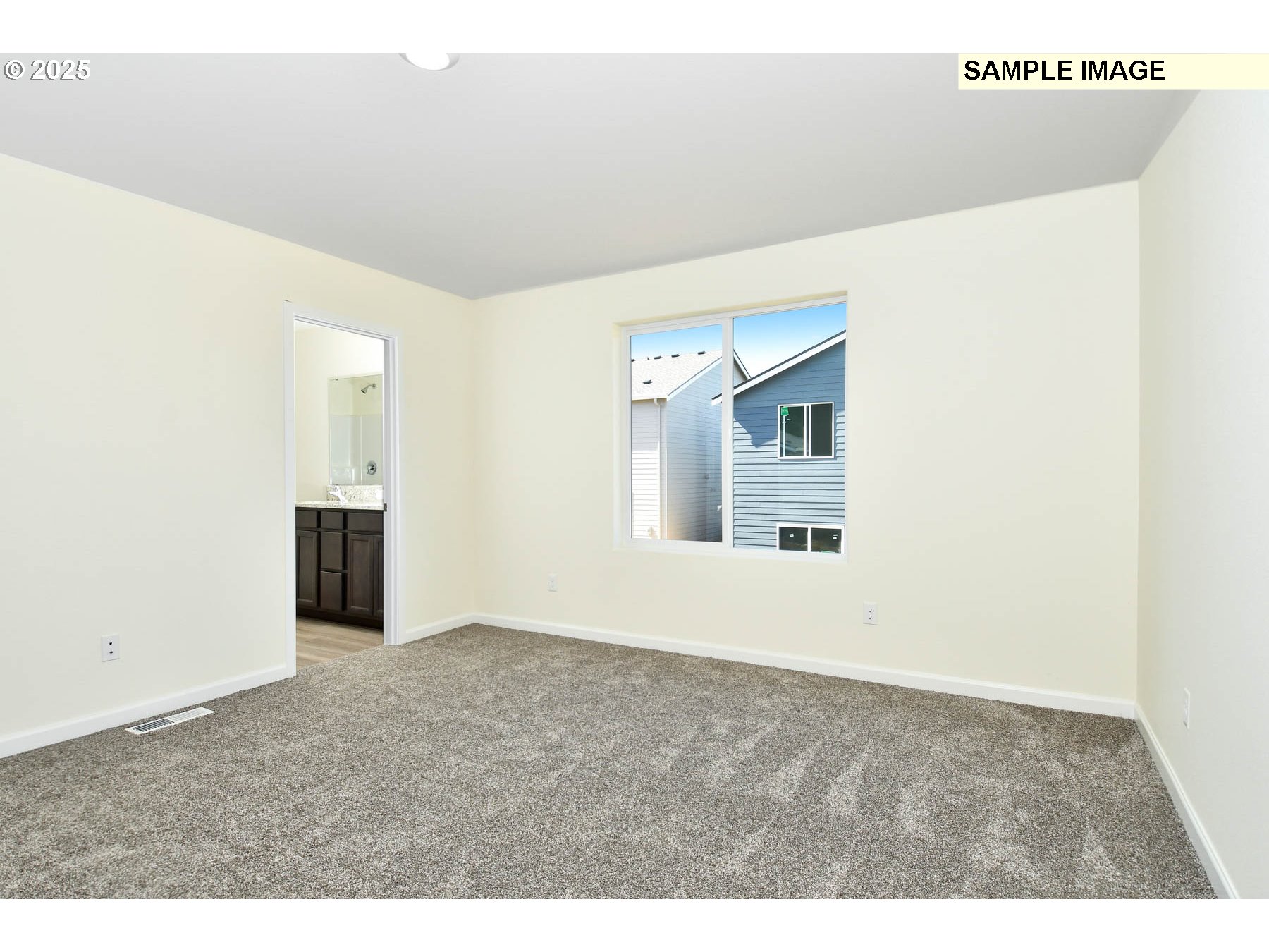 3982 Southwest Duniway Lane Gresham, OR 97080 - Photo 4 of 15 a view of an empty room with wooden floor