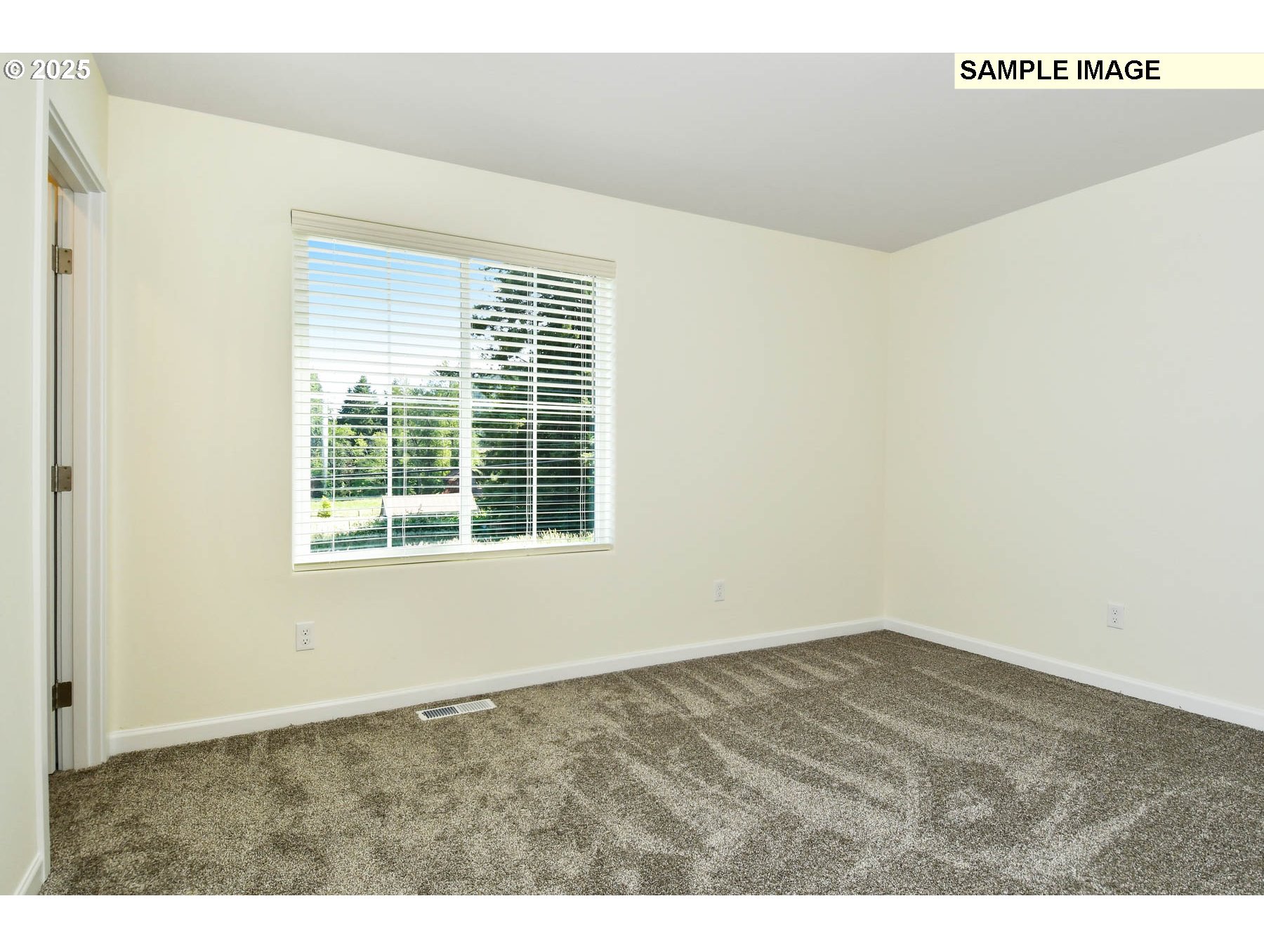 3982 Southwest Duniway Lane Gresham, OR 97080 - Photo 8 of 15 a view of an empty room with wooden floor