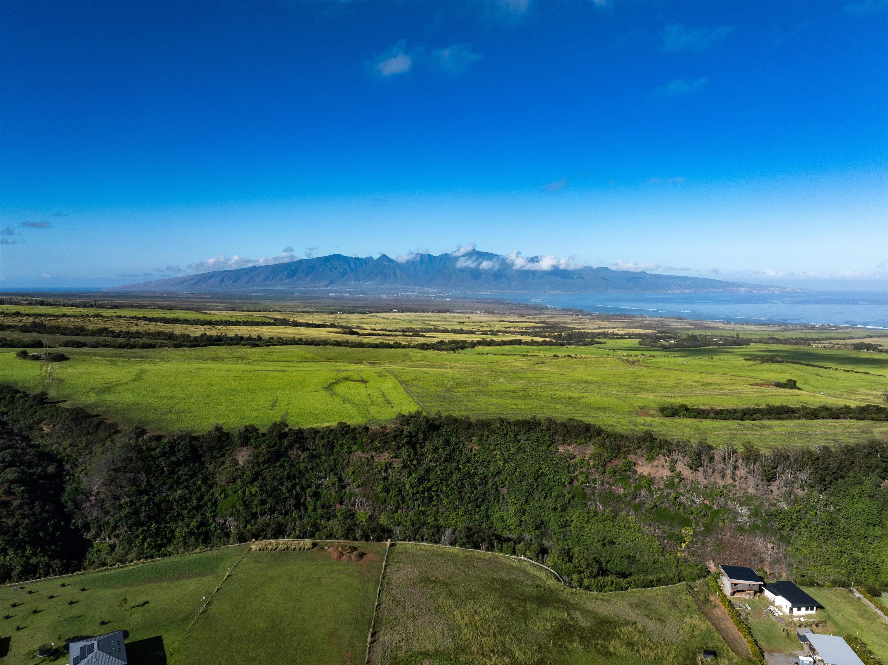 1022 Auwaha Place, Unit A Haiku, HI 96708 - Photo 11 of 26 a view of a lake with a big yard