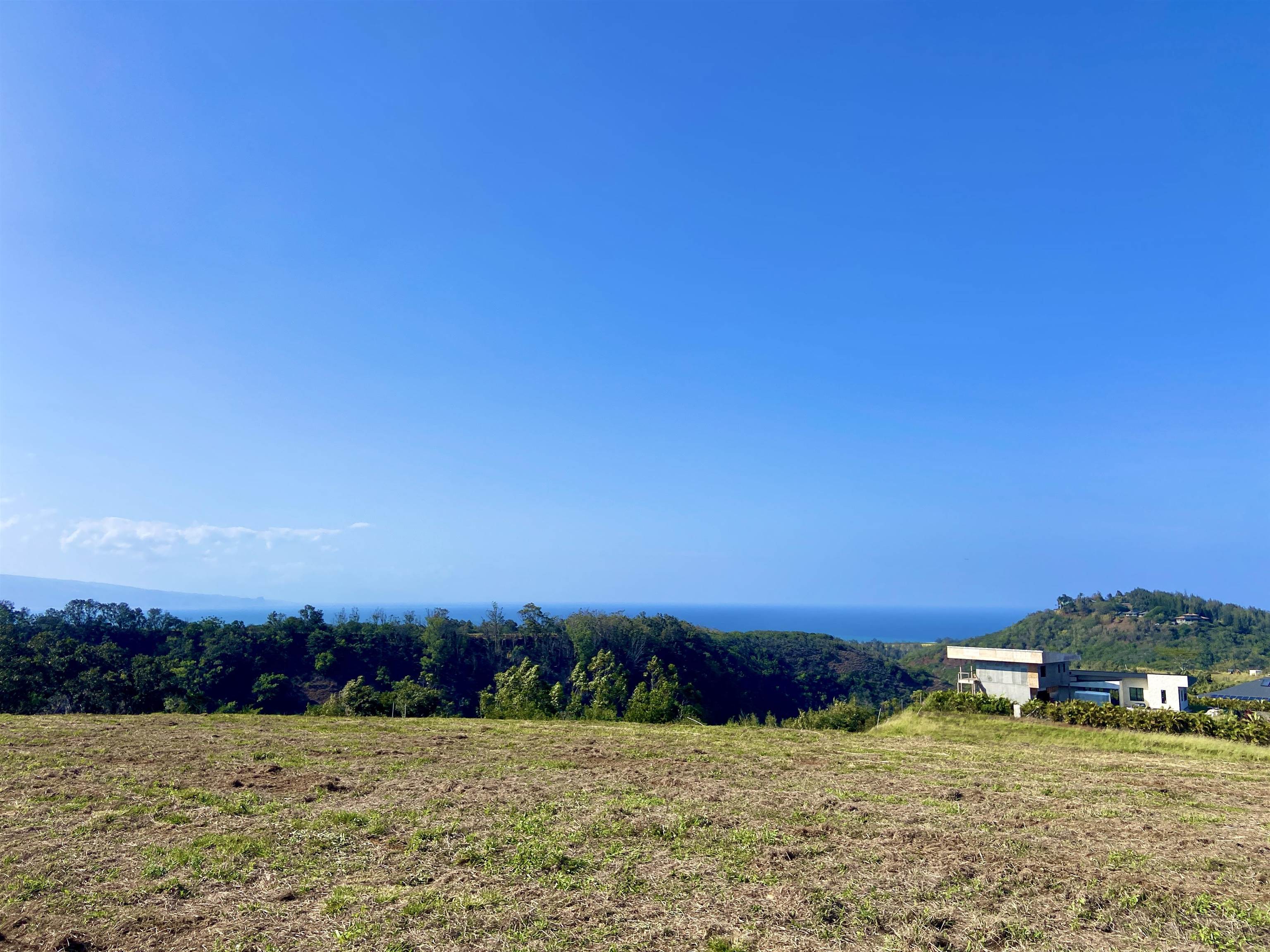 1022 Auwaha Place, Unit A Haiku, HI 96708 - Photo 21 of 29 a view of houses with ocean view