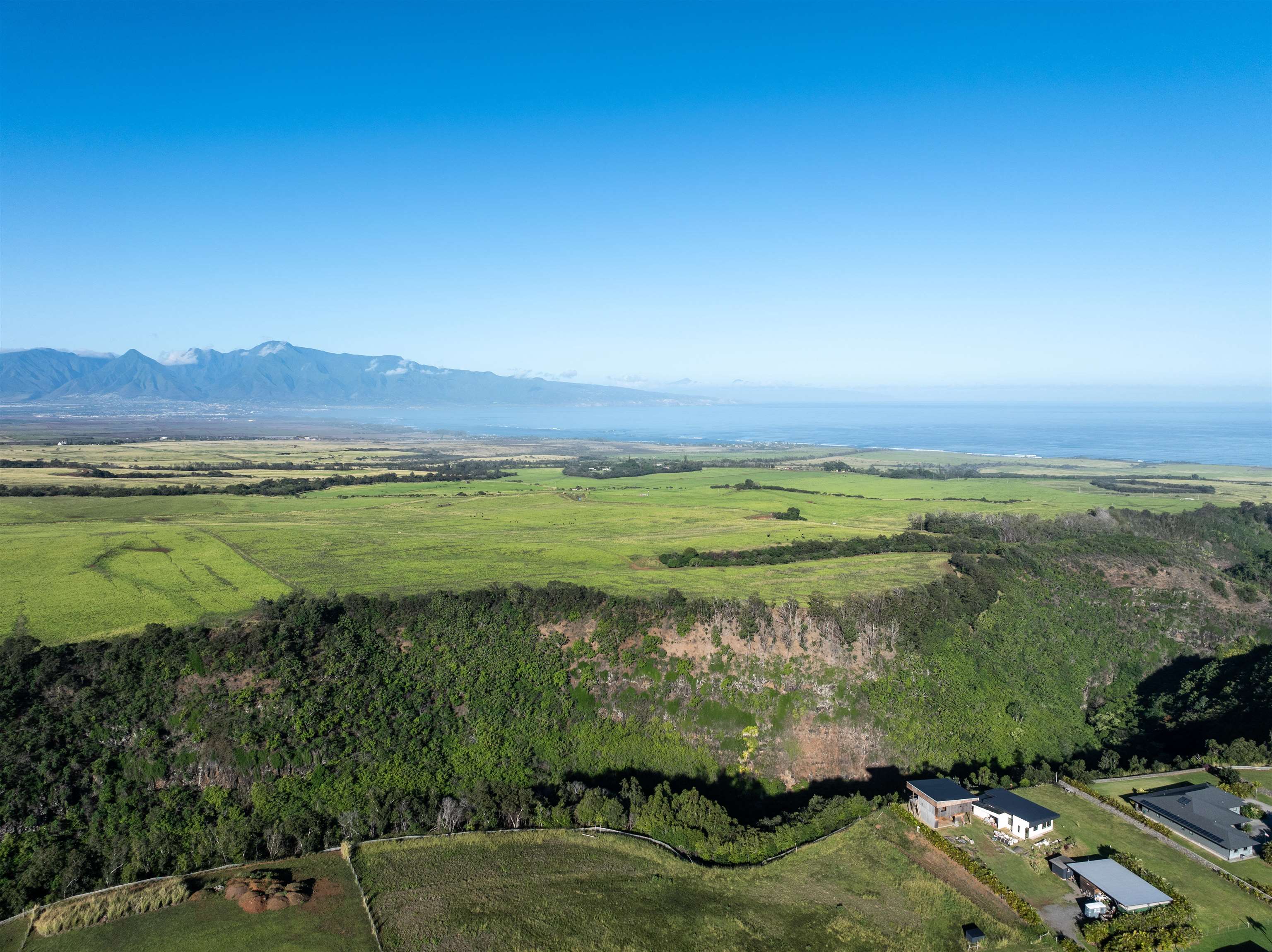 1022 Auwaha Place, Unit A Haiku, HI 96708 - Photo 25 of 29 a view of a lake with a mountain in the background