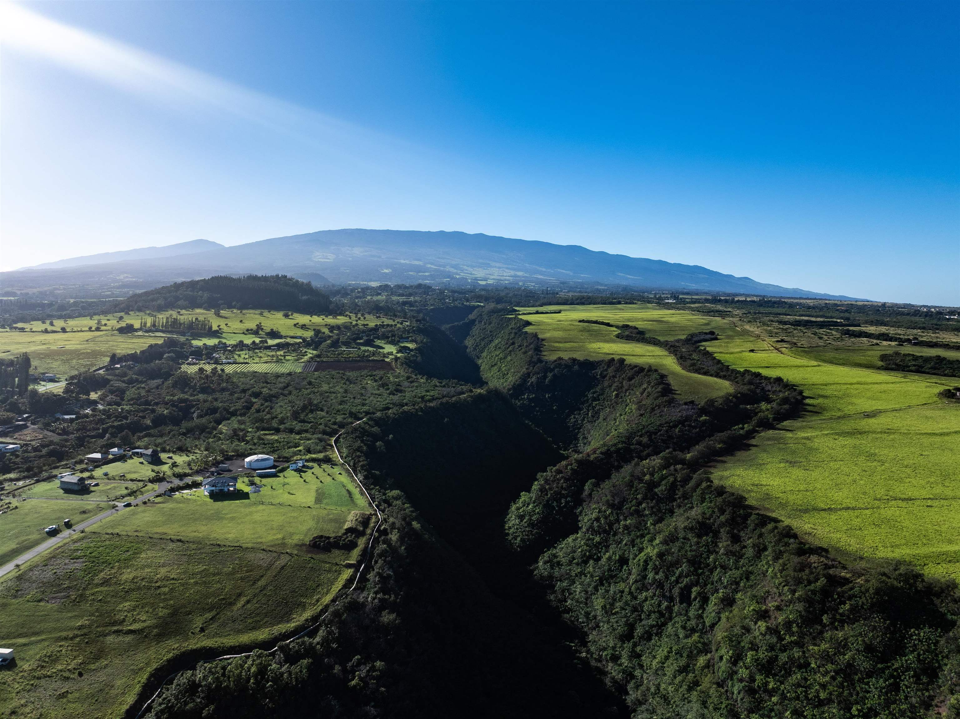 1022 Auwaha Place, Unit A Haiku, HI 96708 - Photo 29 of 29 a view of a lake with a mountain