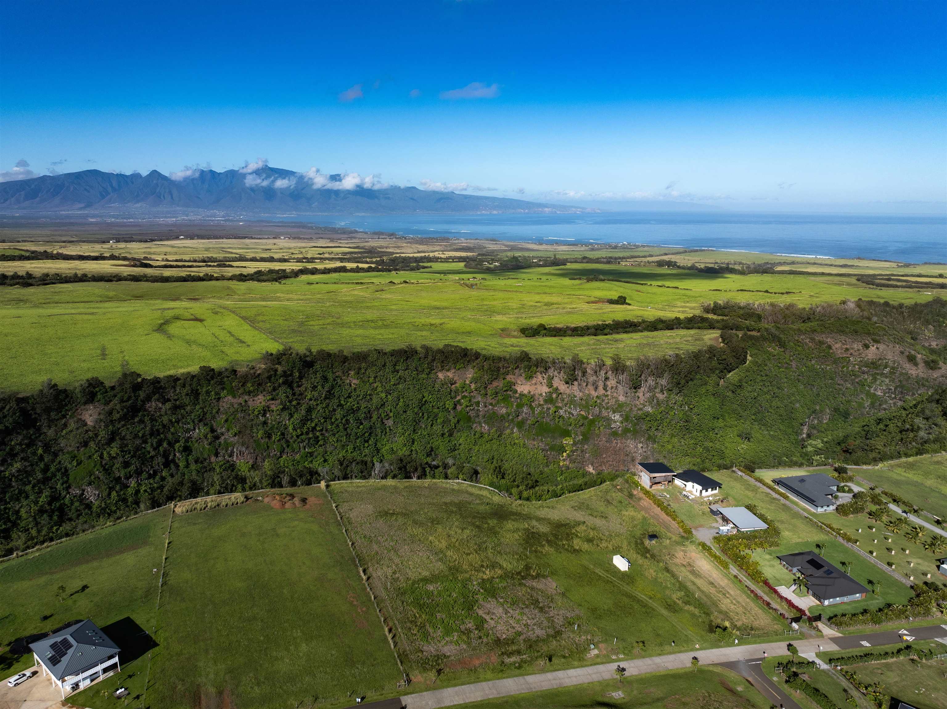 1022 Auwaha Place, Unit A Haiku, HI 96708 - Photo 3 of 26 a view of a lake with a mountain