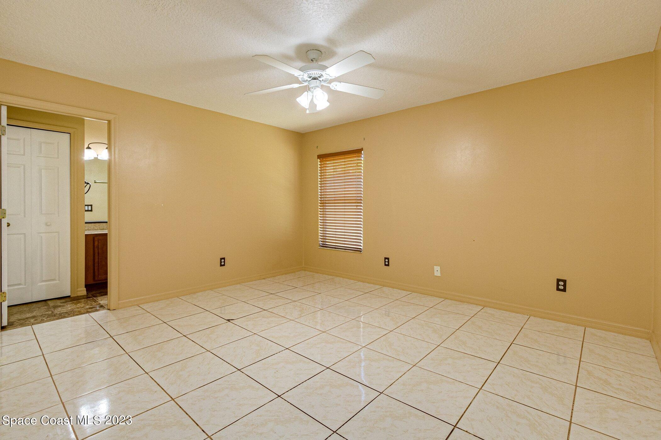1371 Darrow Road Southwest Palm Bay, FL 32908 - Photo 12 of 21 a view of an empty room