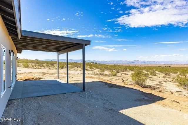 a view of an ocean and a mountain