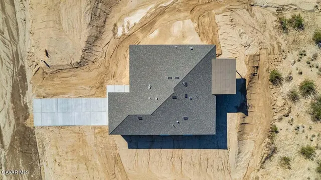 a bathroom with a sink and a shower curtain