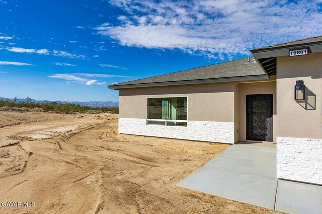 a view of an ocean with beach