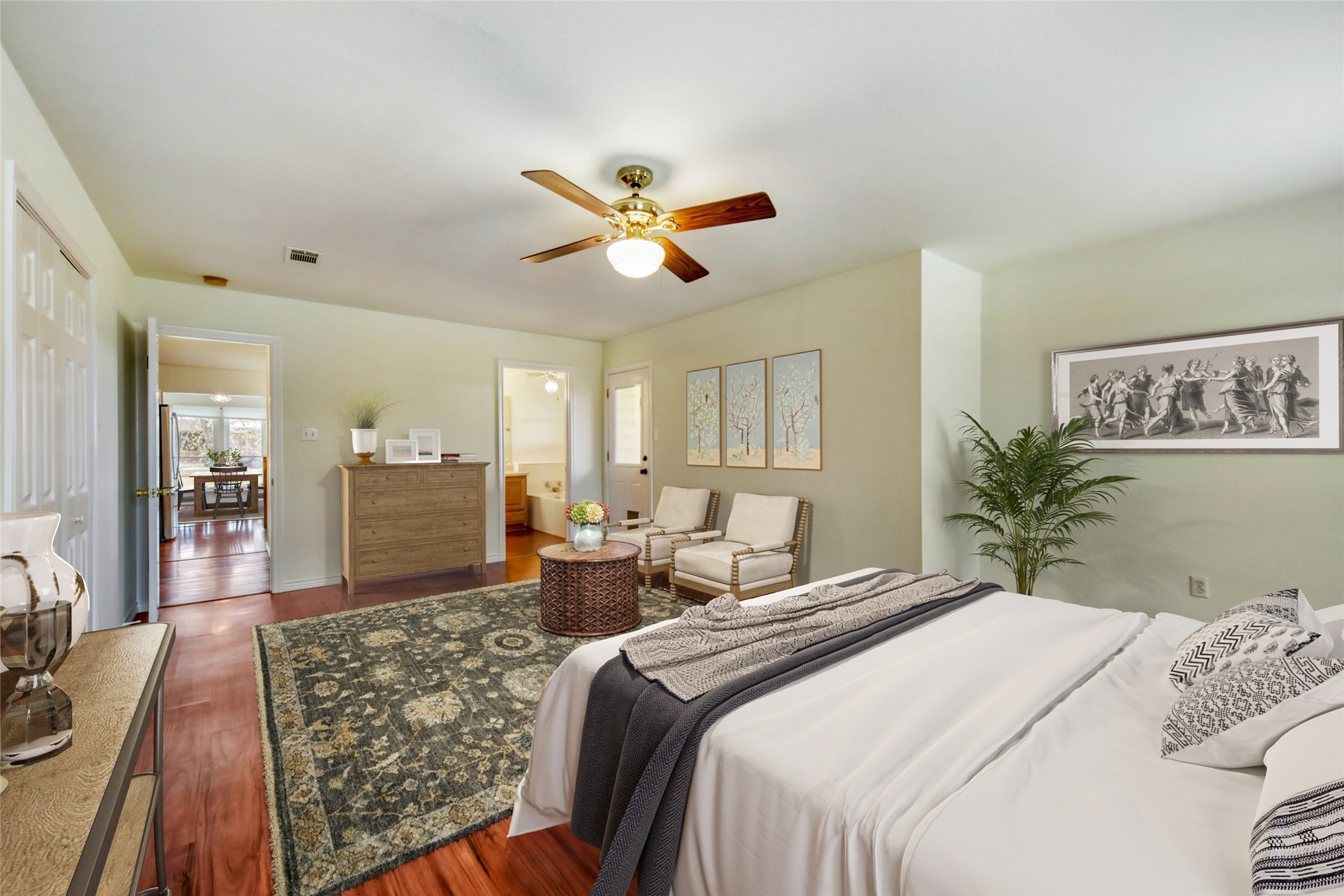 2601 Windy Ridge Road Taylor, TX 76574 - Photo 4 of 30 Bedroom featuring dark wood finished floors, ceiling fan, and ensuite bath