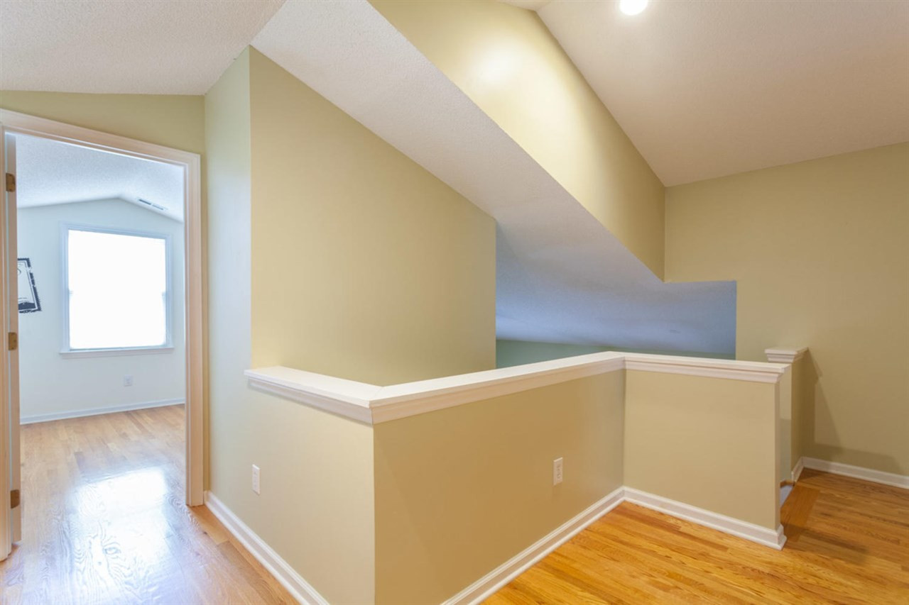 2337 Florida Court Raleigh, NC 27615 - Photo 20 of 25 Hardwoods on 2nd Floor Landing