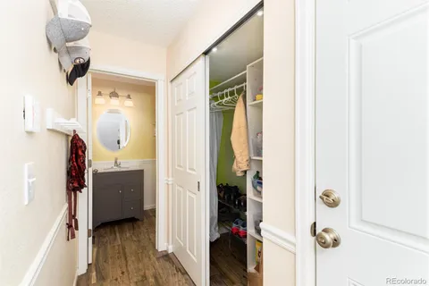 a view of a bathroom from a hallway
