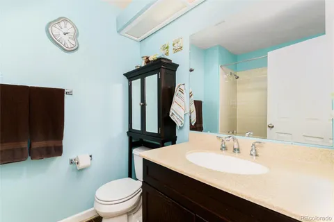 a bathroom with a shower and a shower