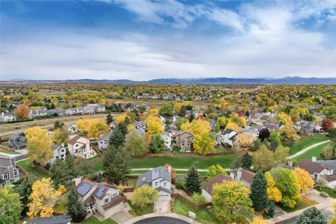 a picture of a bench in front of a wall