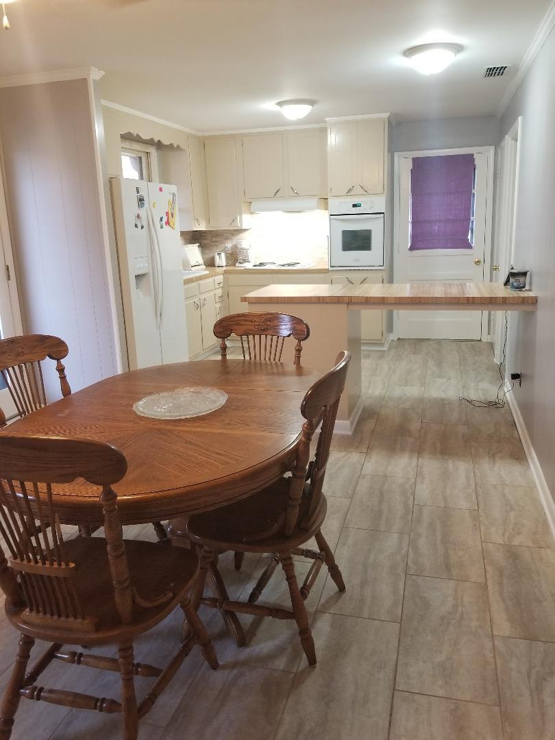 406 Gates Road Goodlettsville, TN 37072 - Photo 6 of 21 a view of a dining room with furniture