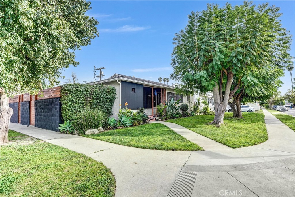7758 Chimineas Avenue Reseda, CA 91335 - Photo 30 of 35 front view of a house with a yard