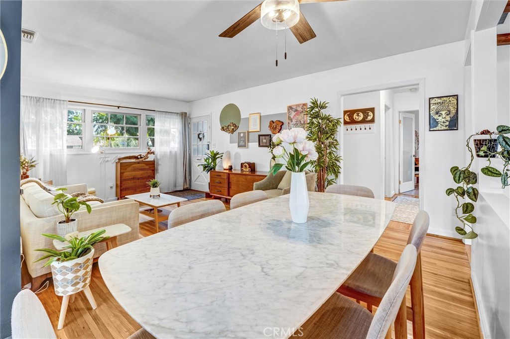 7758 Chimineas Avenue Reseda, CA 91335 - Photo 5 of 35 a living room with furniture and a wooden floor