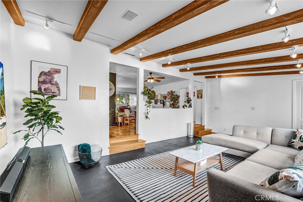 7758 Chimineas Avenue Reseda, CA 91335 - Photo 10 of 35 a living room with furniture and wooden floor