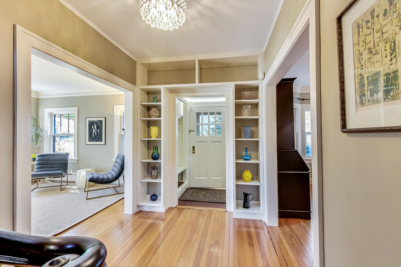 216 Myrtle Street Winnetka, IL 60093 - Photo 4 of 74 a view of a living room with furniture and wooden floor