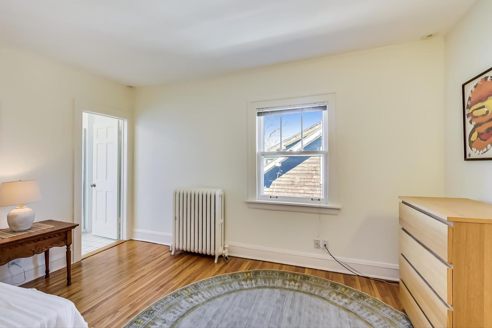 216 Myrtle Street Winnetka, IL 60093 - Photo 44 of 74 a view of an empty room and window