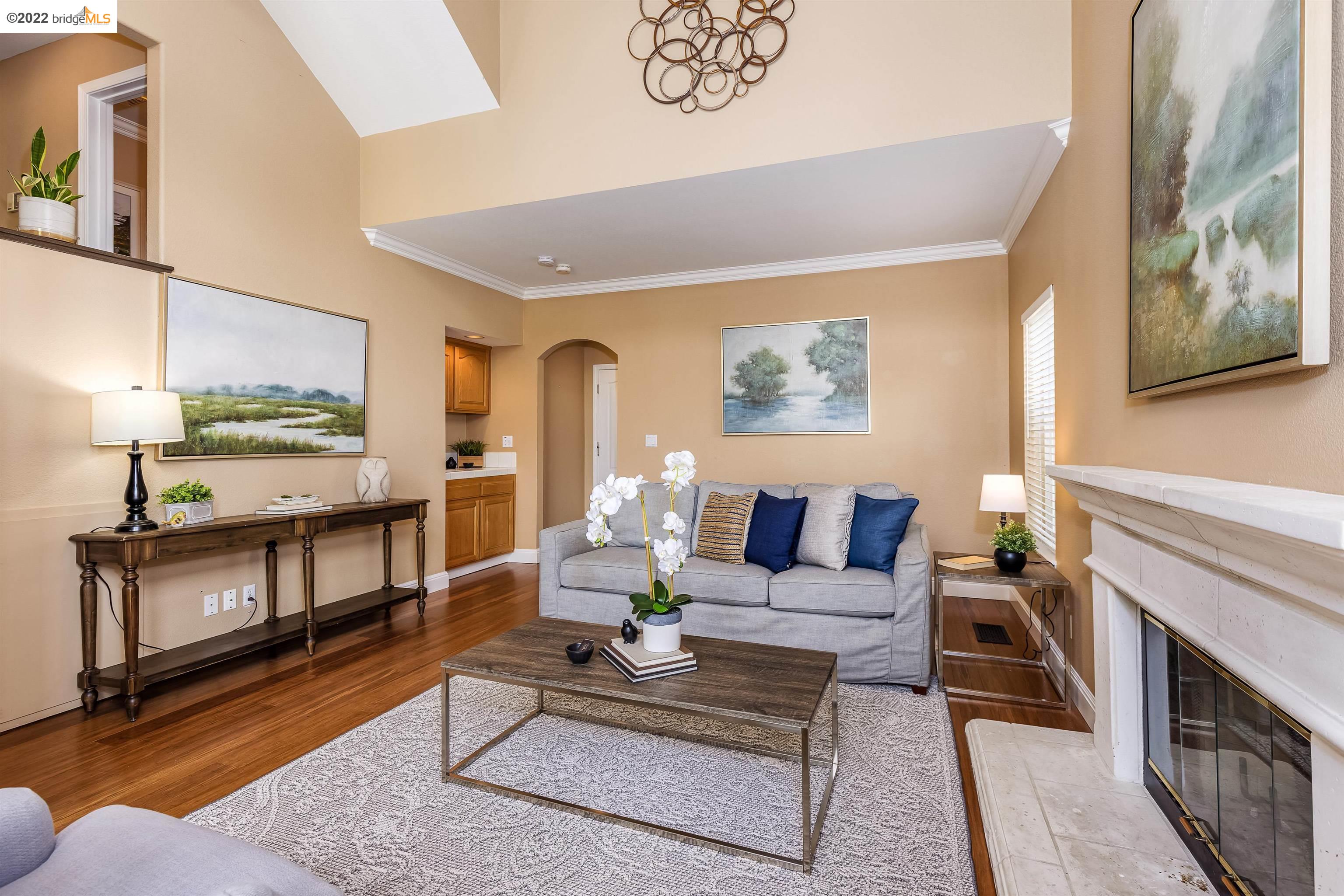 Undisclosed Address Concord, CA 94521 - Photo 16 of 47 a living room with furniture and a fireplace