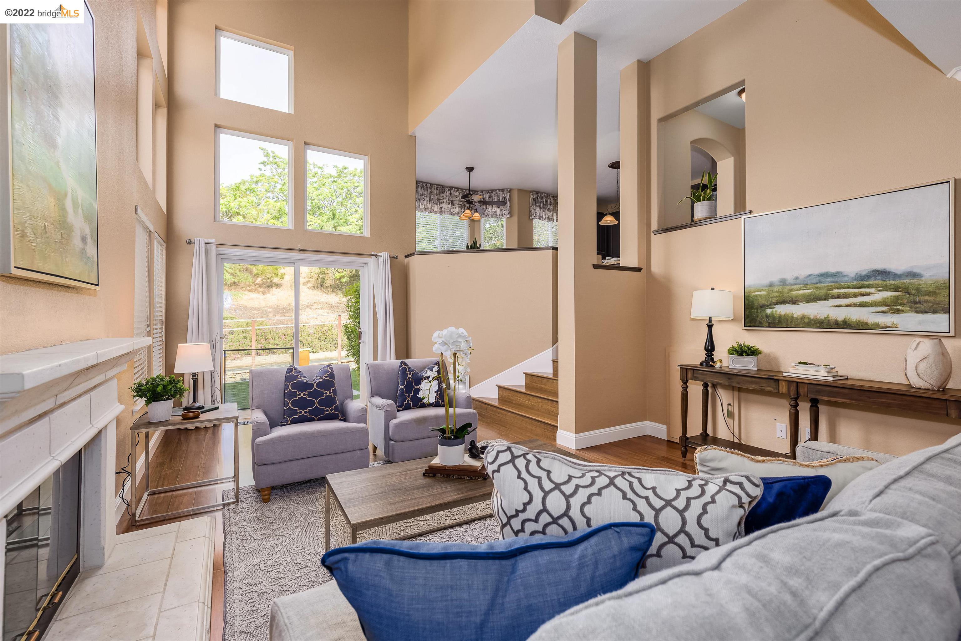 Undisclosed Address Concord, CA 94521 - Photo 18 of 47 a living room with furniture and a large window