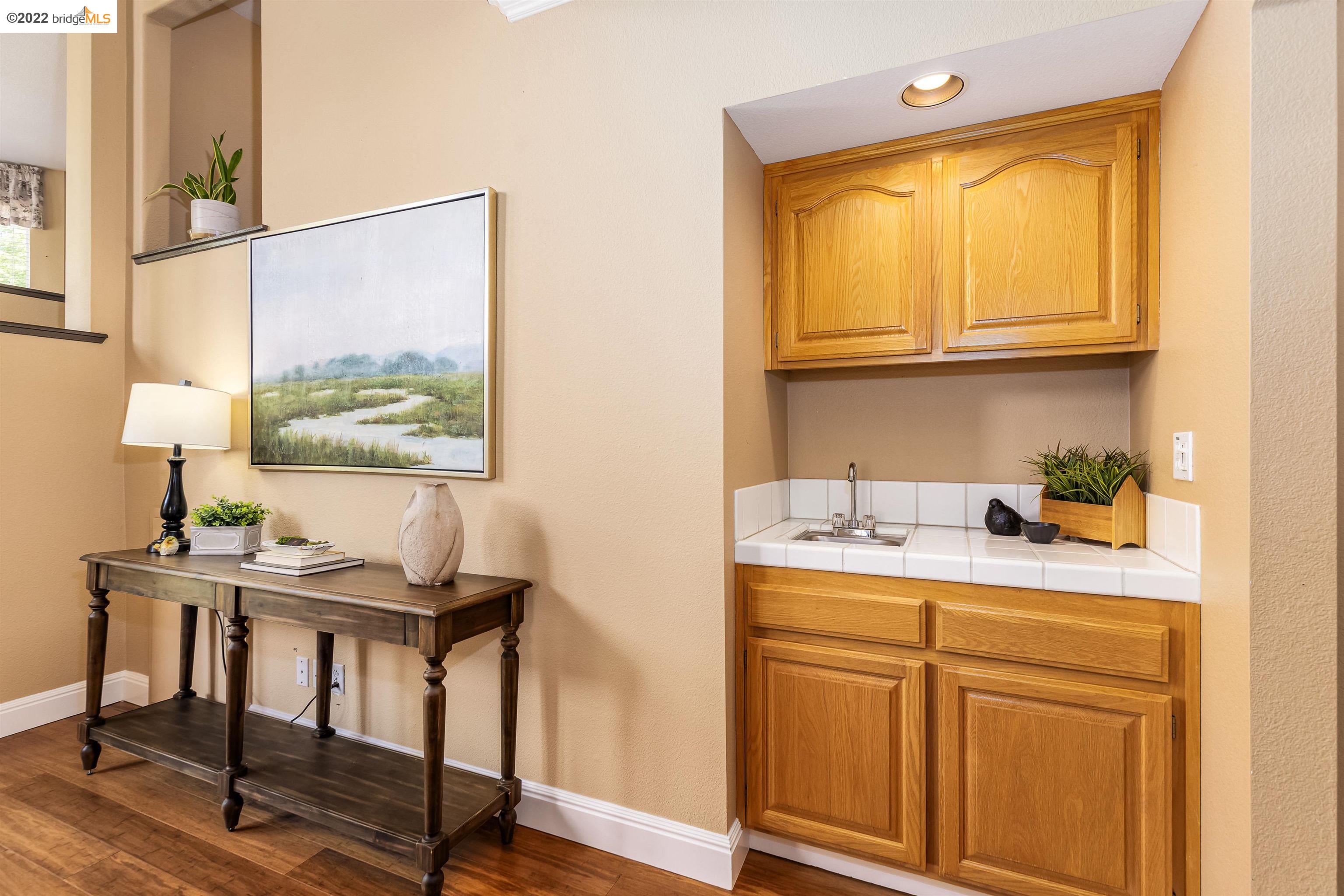 Undisclosed Address Concord, CA 94521 - Photo 19 of 47 a view of a workspace with furniture and a window