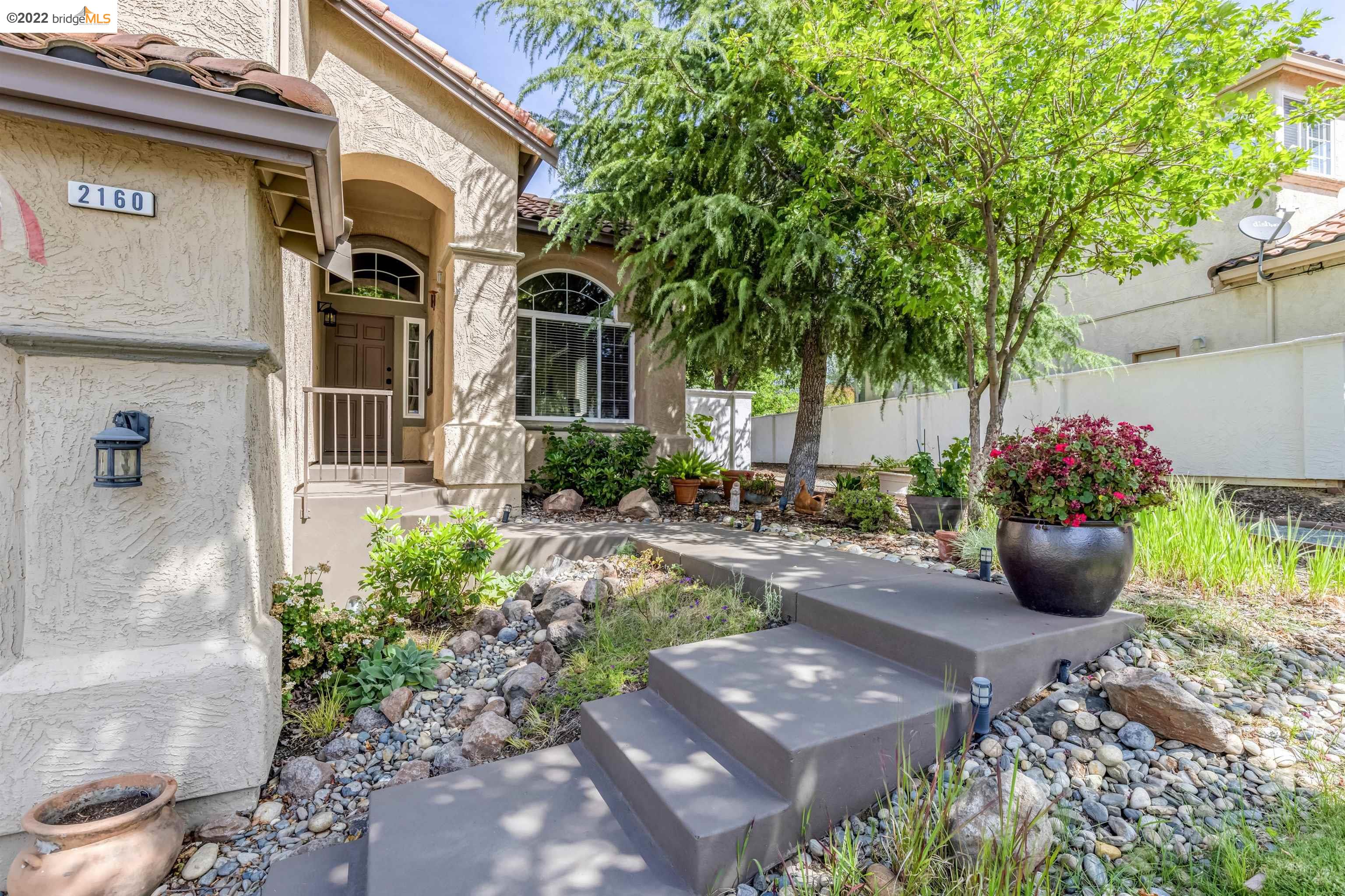 Undisclosed Address Concord, CA 94521 - Photo 3 of 47 a view of a patio with plants and plants