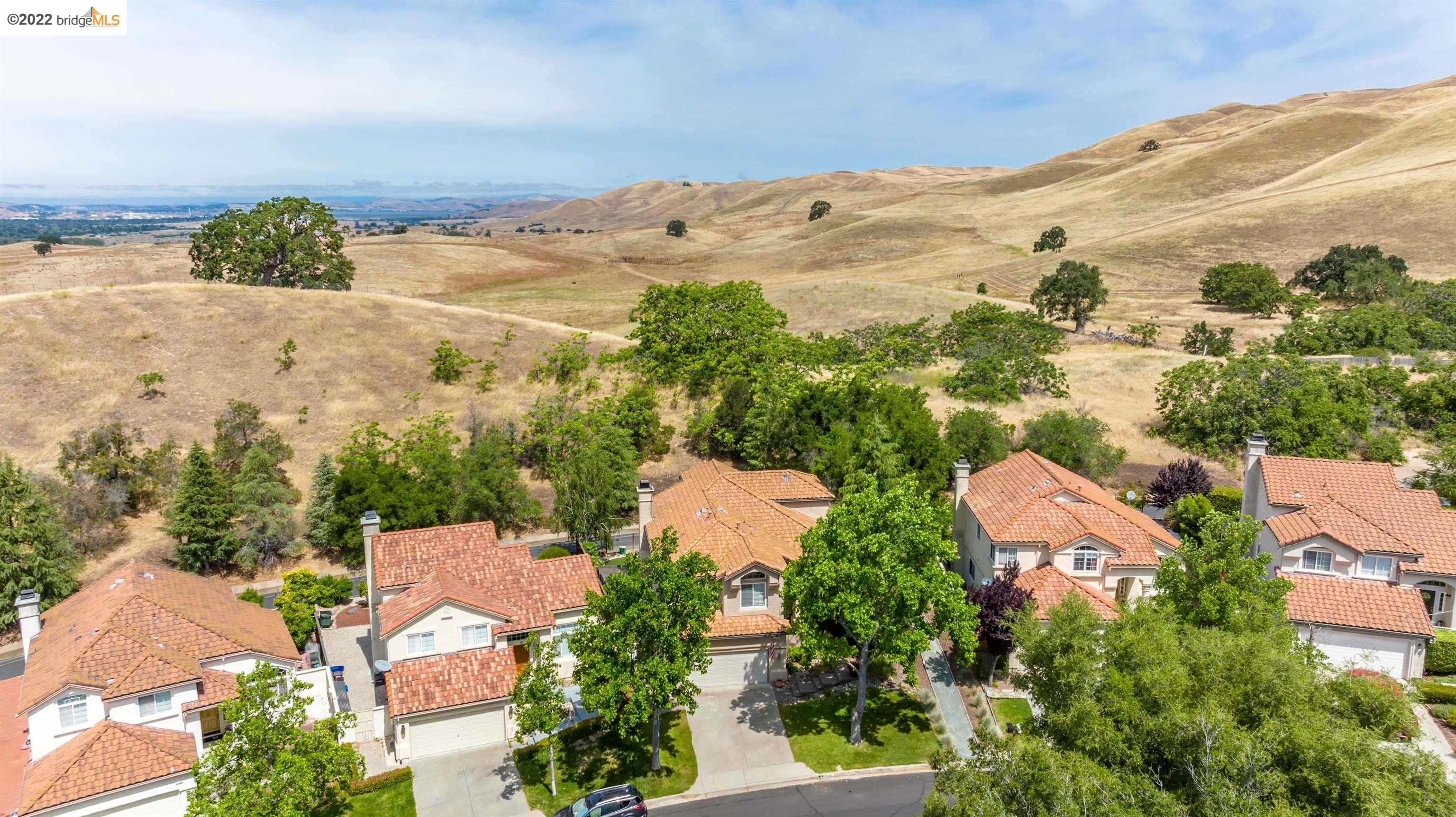 Undisclosed Address Concord, CA 94521 - Photo 41 of 47 an aerial view of a house with a mountain