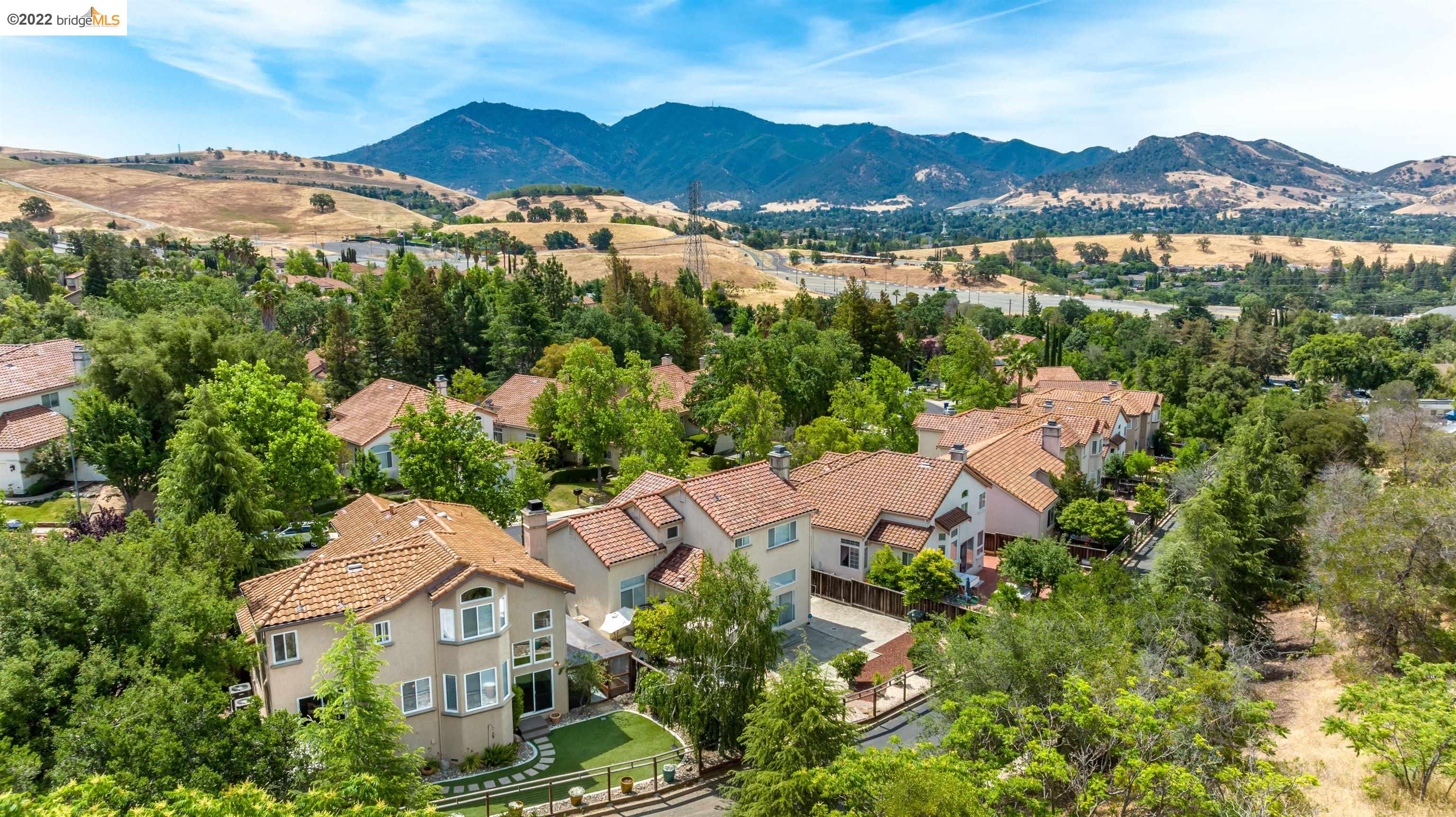 Undisclosed Address Concord, CA 94521 - Photo 43 of 47 an aerial view of house with yard and mountain view