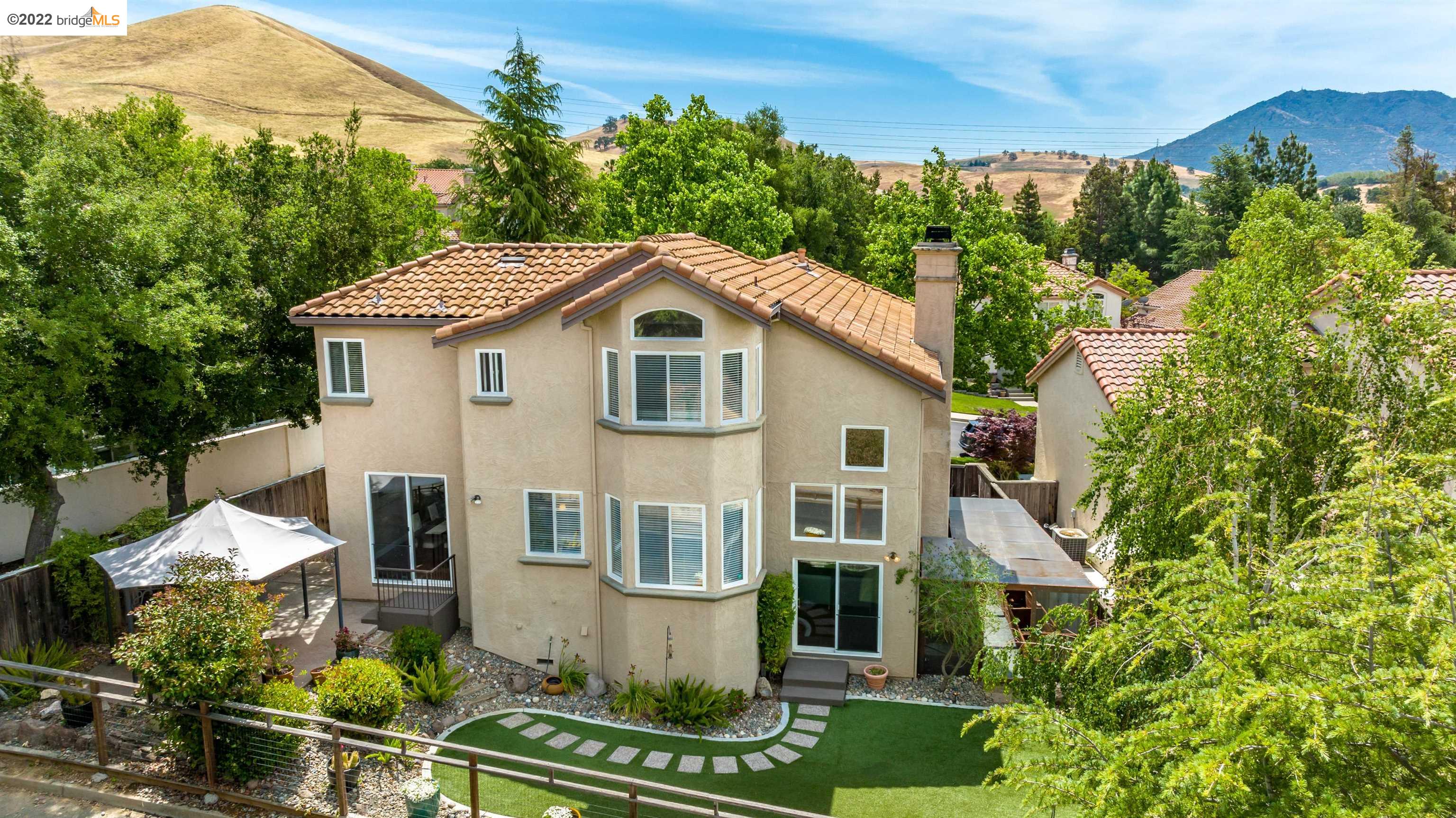Undisclosed Address Concord, CA 94521 - Photo 46 of 47 a front view of a house with a yard