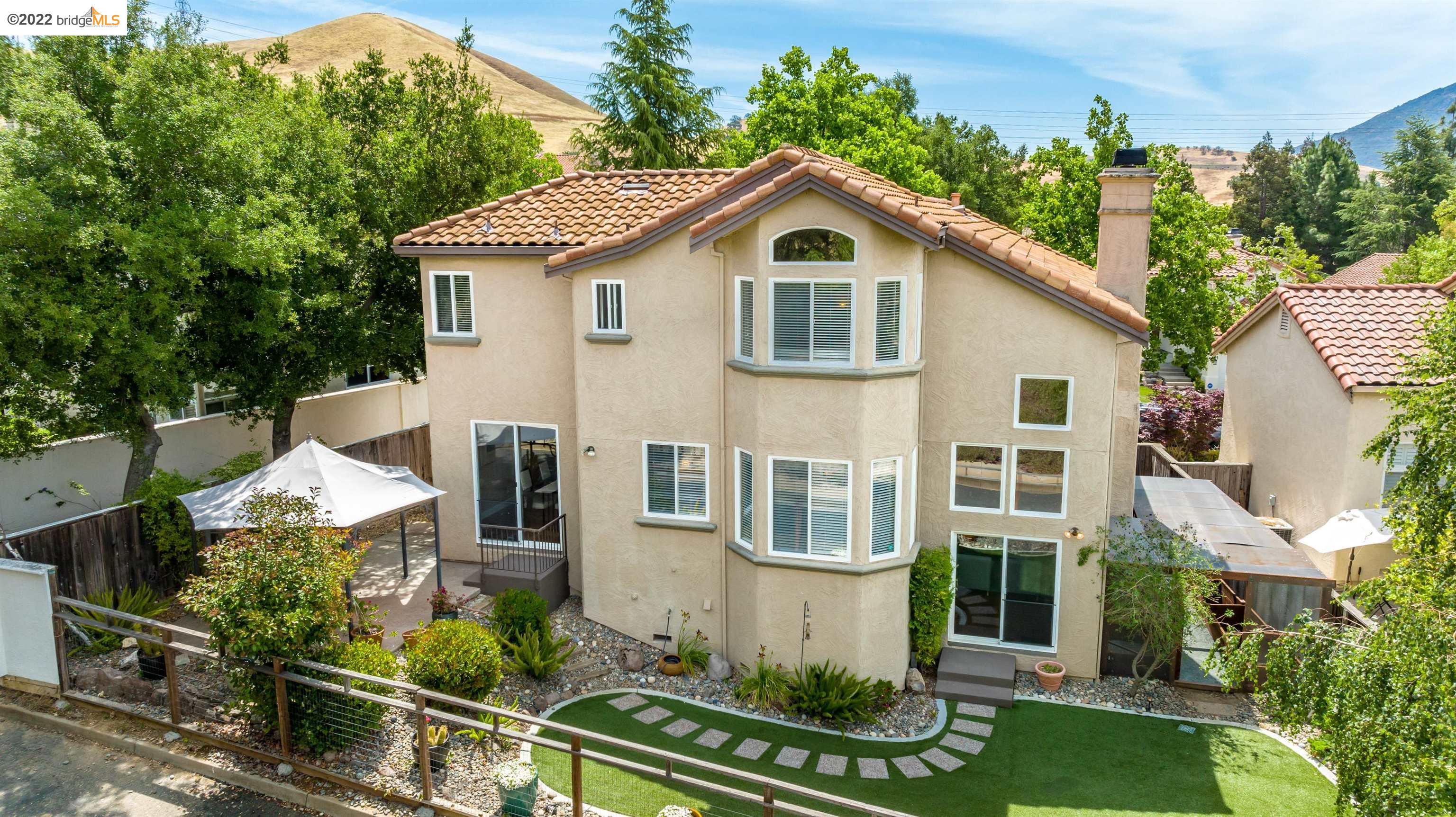 Undisclosed Address Concord, CA 94521 - Photo 47 of 47 a front view of a house with a yard