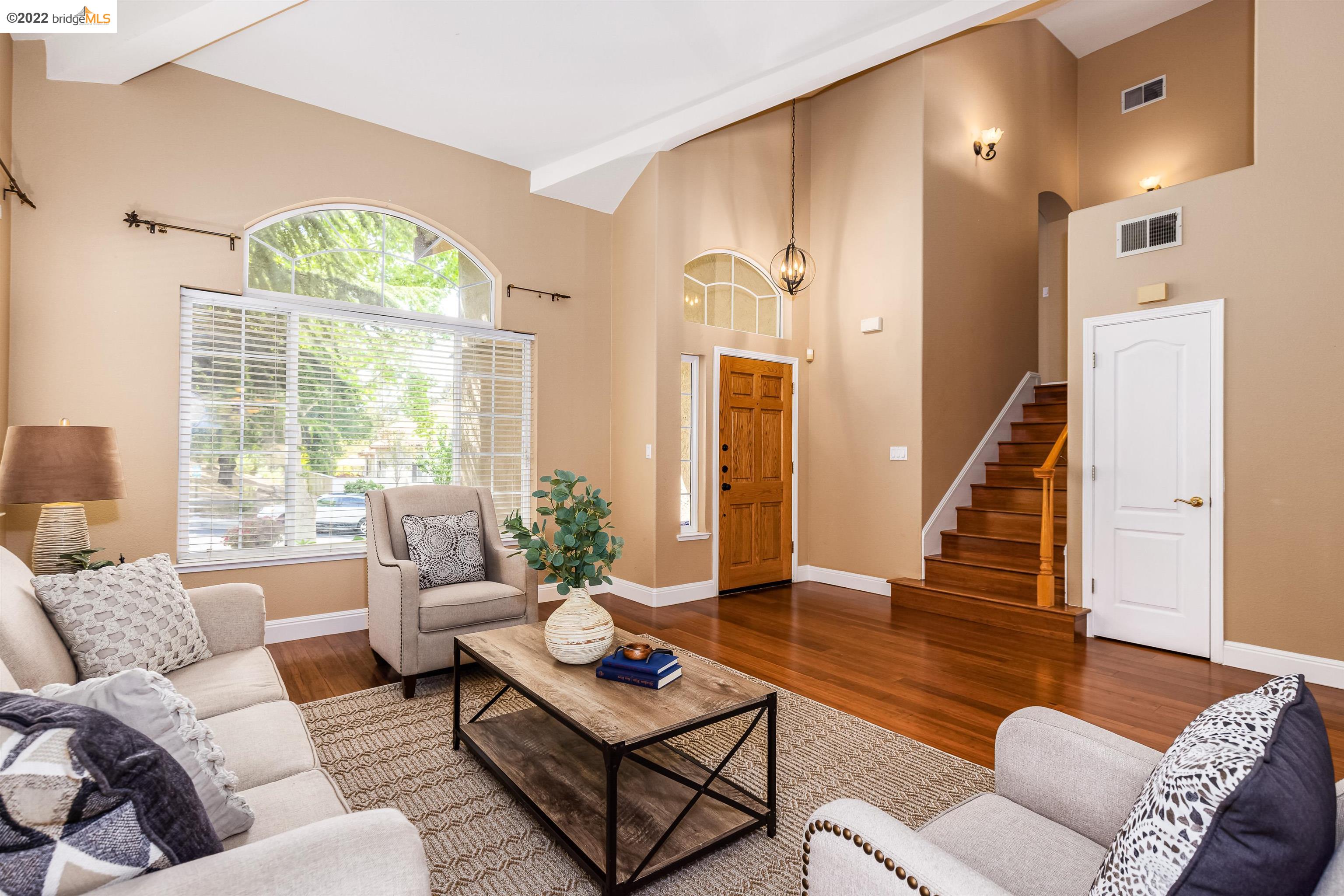 Undisclosed Address Concord, CA 94521 - Photo 6 of 47 a living room with furniture and a table