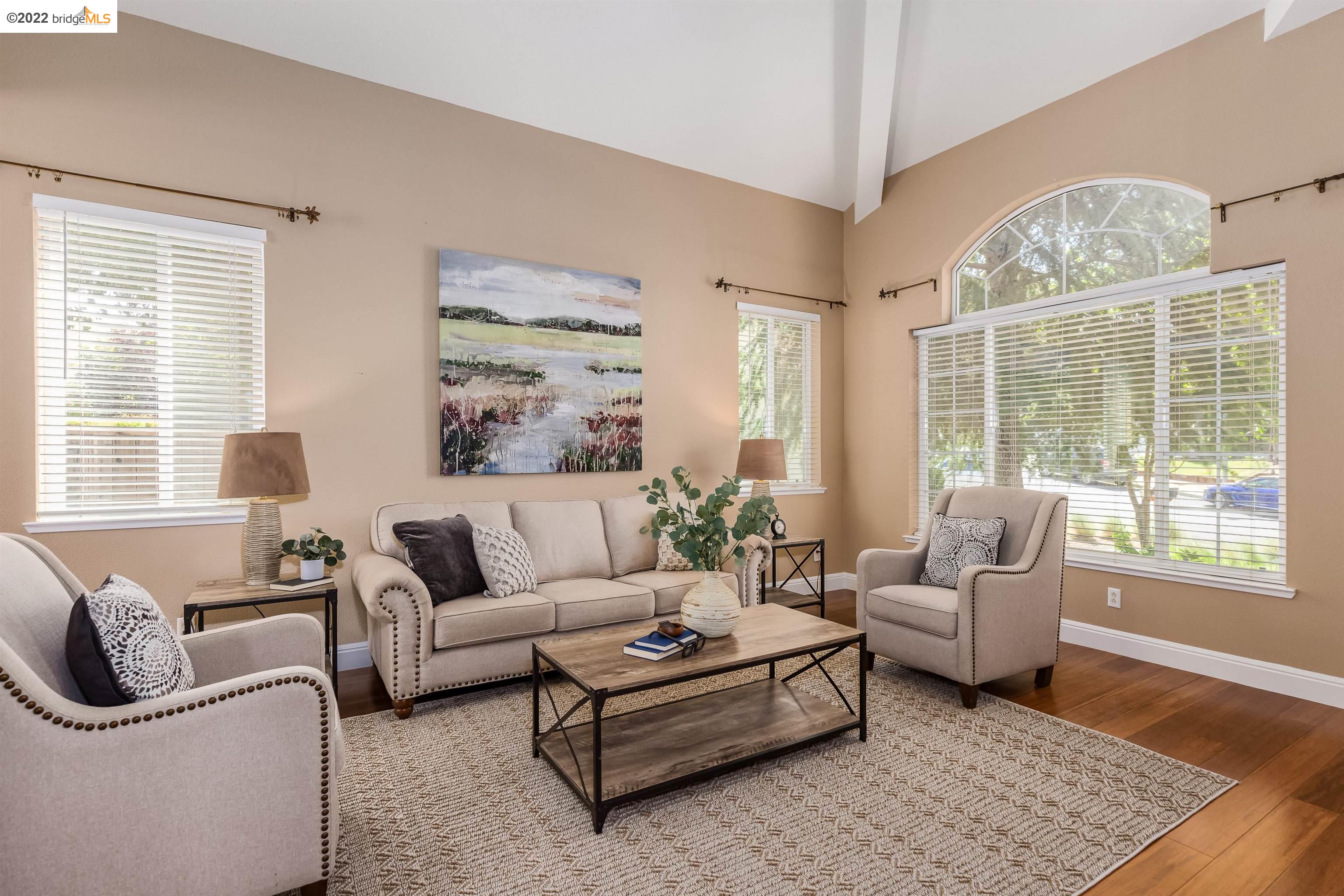 Undisclosed Address Concord, CA 94521 - Photo 7 of 47 a living room with furniture and a large window
